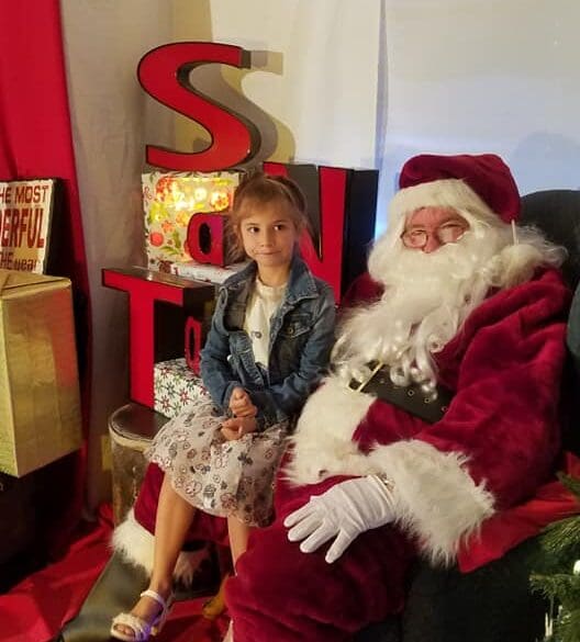 Santa comes to Heritage Academy in Laveen in a helicopter.