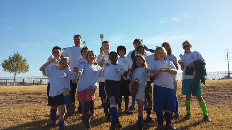 Laveen Soccer team celebrates with Coach Andy Tring at the end of the season in October 2016. Laveen Soccer team celebrates with Coach Andy Tring at the end of the season in October 2016.
