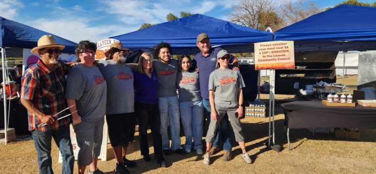 Members of the Laveen Community Council and Phoenix Mayor Kate Gallego (center) pose at the Laveen BBQ 2025 Members of the Laveen Community Council and Phoenix Mayor Kate Gallego (center) pose at the Laveen BBQ 2025