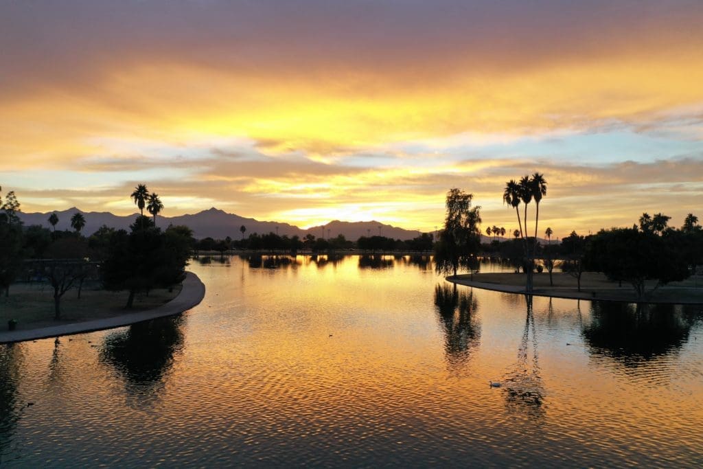 Lake Alvord in Laveen with South Mountain a silhouette in the background.